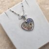 💖 Pendentif cœur en fleurs séchées – Transparence naturelle & acier inoxydable